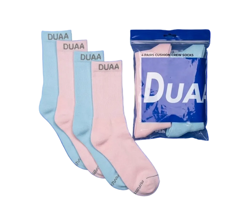 Four pairs of DUAA cushion crew socks in pastel blue and pink, shown with one sock unfolded and three folded pairs fanned out next to their blue branded packaging bag. The brand name 'DUAA' is visible on the socks and packaging.